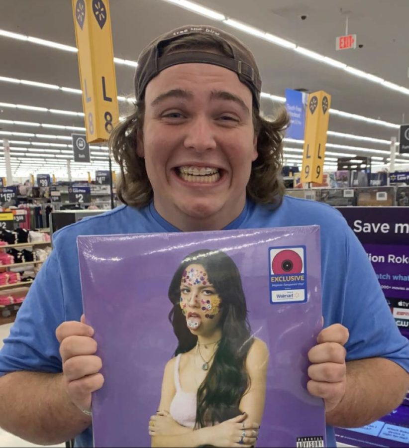 Kieran Banks purchasing the SOUR album at Walmart