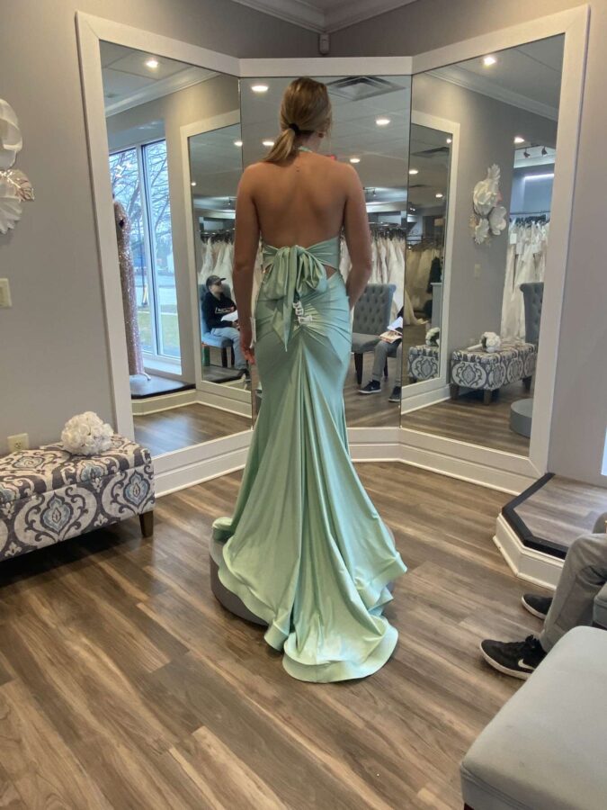 Aundrea F. trying on a gorgeous mint dress at Country Bride and Gent. March 23.