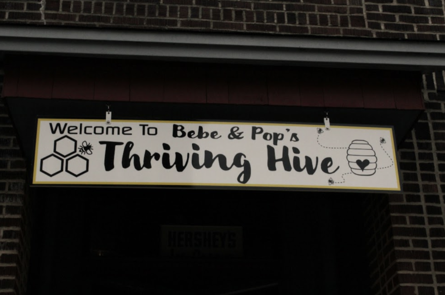 The welcoming sign posted outside the restaurant entrance.