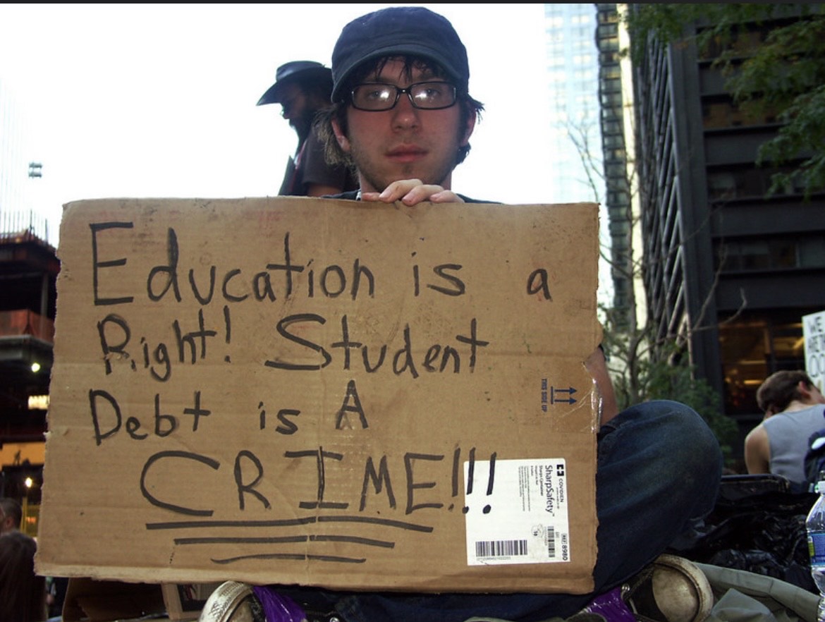 A college student makes his opinions heard about education and student debt.
