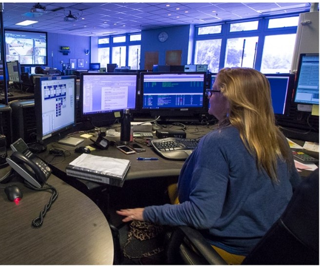 Torrance Police Department
911 Dispatcher working at her desk.
