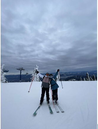 Avery Stewart and Raena Hall skiing at Schweitzer