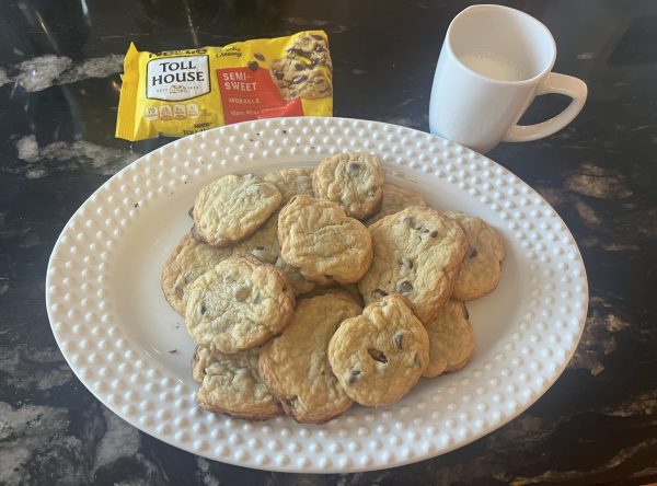 Our homemade cookies following Nestle Toll-House’s homemade chocolate chip cookie dough recipe, served with a cup of milk.