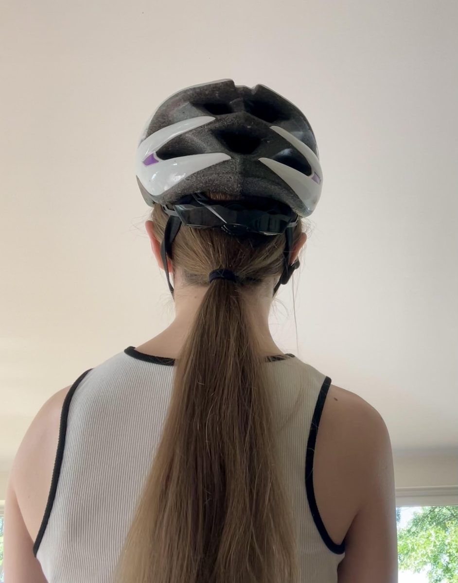 Natalie wearing a low ponytail hairstyle for her bike ride.