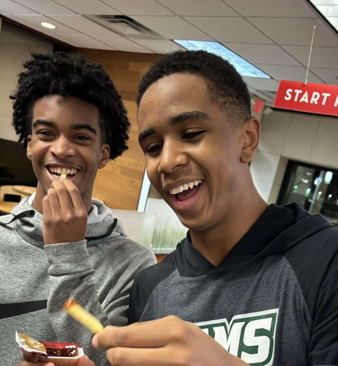 Xavier Peters and Marley Steward enjoy their Wendy's fries with barbeque sauce