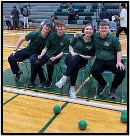 Cooper, Mason, Emma, and Kyle are playing Unified Bocce at Pennridge High School. 