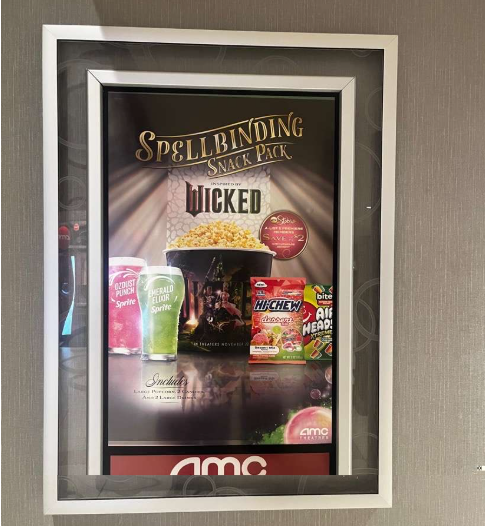 Movie poster of Wicked at the theaters. 