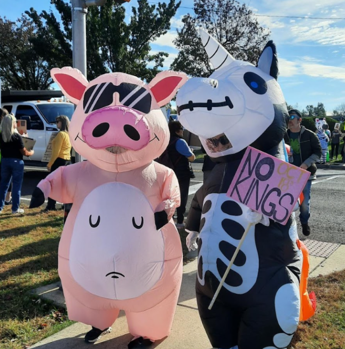Protesters dress up in inflatables for the No Kings Protest on October 18, 2025 in Perkasie, PA.