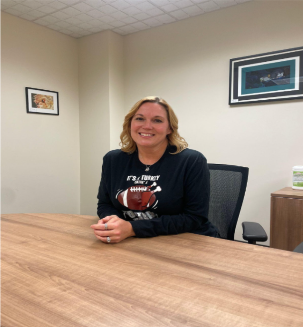 Kat Harrington working in the main office.
