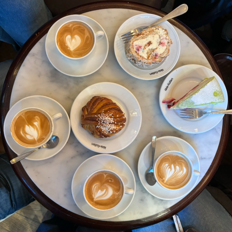 An array of coffee and pastries during a fika break in Stockholm, Sweden.