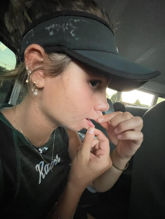 Liv getting in the mindset to play on the bus ride to an away match